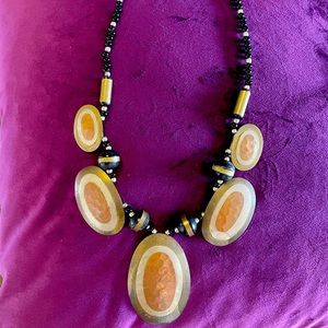 Statement necklace. Hand crafted, hammered copper, silver and brass with beads.